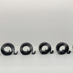 Volute spiral spring