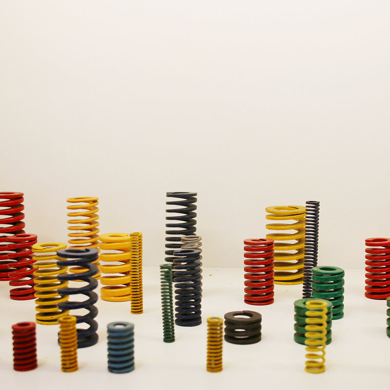 Precision compression spring